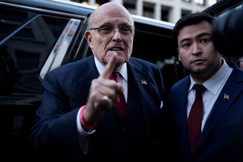 &copy; Reuters. FILE PHOTO: Former New York Mayor Rudy Giuliani departs the U.S. District Courthouse after he was ordered to pay $148 million in his defamation case in Washington, U.S., December 15, 2023. REUTERS/Bonnie Cash/File Photo