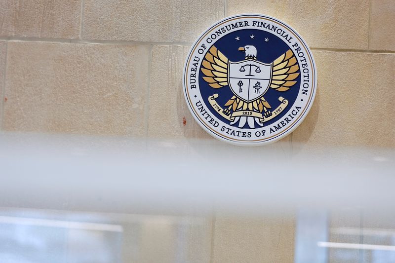 &copy; Reuters. FILE PHOTO: The seal of the Consumer Financial Protection Bureau (CFPB) is seen at their headquarters in Washington, D.C., U.S., May 14, 2021. REUTERS/Andrew Kelly/File Photo