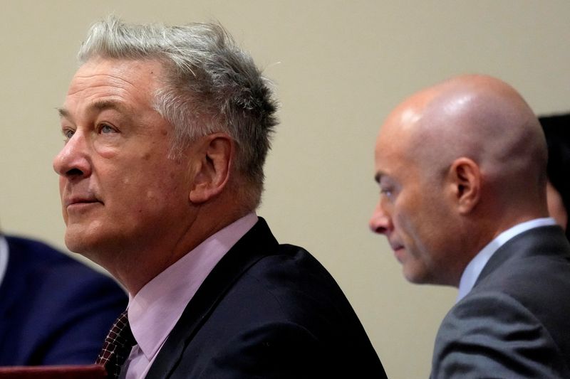 © Reuters. Actor Alec Baldwin and attorney Luke Nikas listen during his hearing in Santa Fe County District Court, Wednesday, July 10, 2024, in Santa Fe, N.M. Baldwin is facing a single charge of involuntary manslaughter in the death of a cinematographer.      Ross D. Franklin/Pool via REUTERS