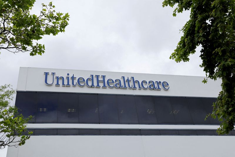 &copy; Reuters. FILE PHOTO: The corporate logo of the UnitedHealth Group appears on the side of one of their office buildings in Santa Ana, California, U.S., April 13, 2020.      REUTERS/Mike Blake/File Photo/File Photo