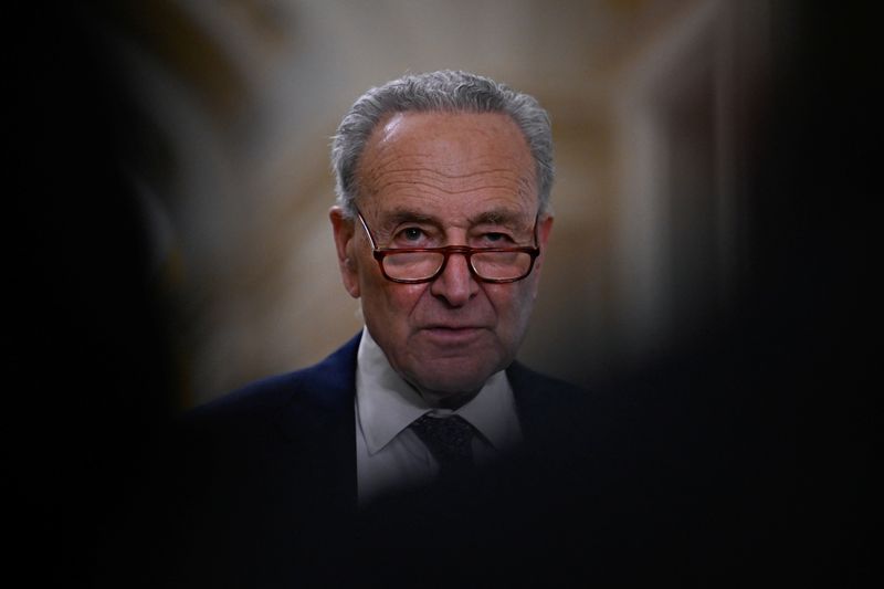 © Reuters. FILE PHOTO: Senate Majority Leader Chuck Schumer (D-NY) looks on at a press conference following the weekly Senate caucus luncheons on Capitol Hill in Washington, U.S., June 12, 2024. REUTERS/Craig Hudson/File Photo