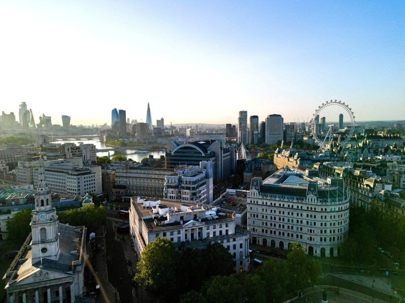 &copy; Reuters. FILE PHOTO: A drone view of London's skyline after daybreak, in London, Britain July 7, 2023. REUTERS/Yann Tessier/File Photo