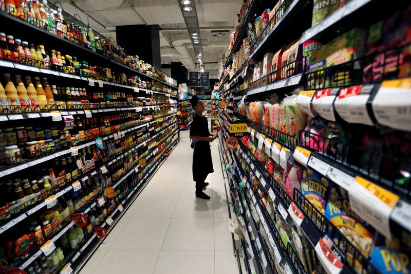 &copy; Reuters. FILE PHOTO: An employee is seen inside the Gourmet Market supermarket in Bangkok, Thailand May 20, 2017. REUTERS/Jorge Silva/File Photo