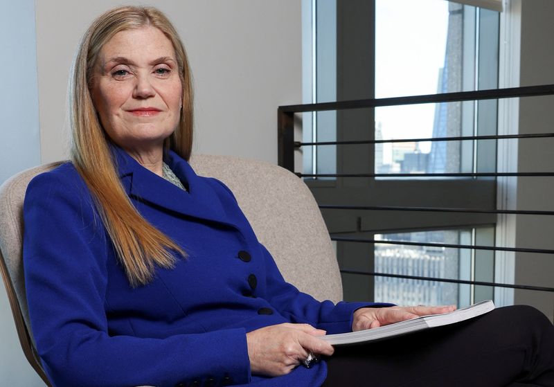 &copy; Reuters. FILE PHOTO: The CEO of Consumer and Community Banking, Marianne Lake poses for portraits at the JP Morgan headquarters in New York City, U.S., July 2, 2024.  REUTERS/Kent J. Edwards/File Photo