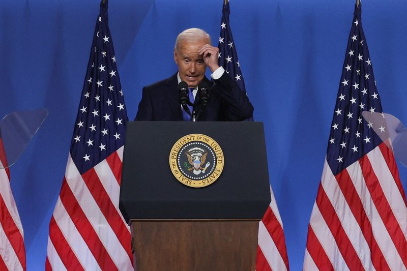 © Reuters. U.S. President Joe Biden reacts as he attends a press conference during NATO's 75th anniversary summit, in Washington, U.S., July 11, 2024. REUTERS/Leah Millis