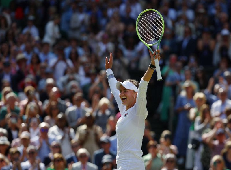 &copy; Reuters. Tennis - Wimbledon - All England Lawn Tennis and Croquet Club, London, Britain - July 13, 2024 Czech Republic's Barbora Krejcikova celebrates winning the final against Italy's Jasmine Paolini REUTERS/Hannah Mckay