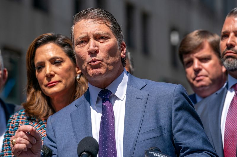 &copy; Reuters. Congressman Ronny Jackson (R-TX) speaks during a press conference by supporters of former U.S. President Donald Trump after they attended his trial for allegedly covering up hush money payments linked to extramarital affair with Stormy Daniels, in Manhatt