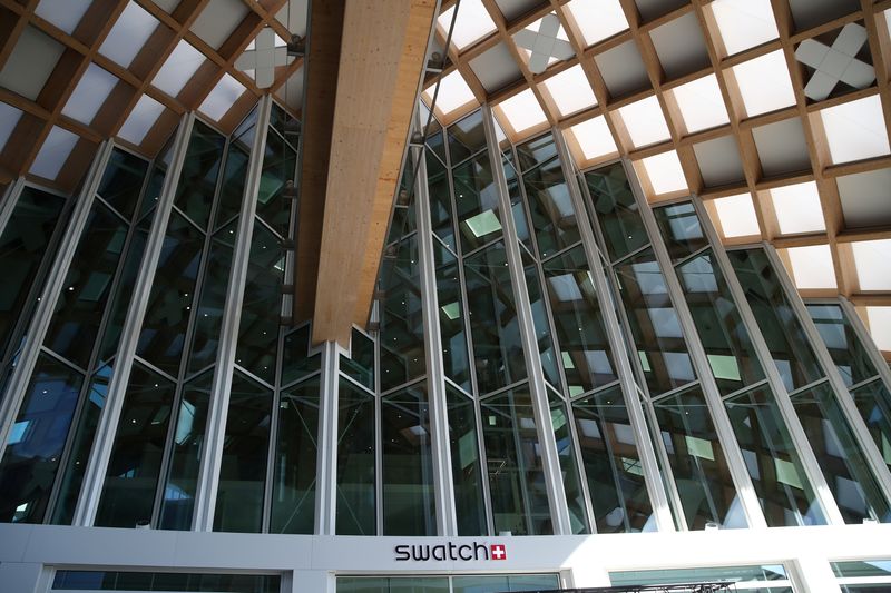 &copy; Reuters. FILE PHOTO: A Swatch logo is pictured on the newly built headquarters, designed by Japanese architect Shigeru Ban, of the brand owned by Swatch Group, in Biel, Switzerland October 3, 2019. REUTERS/Denis Balibouse/File photo