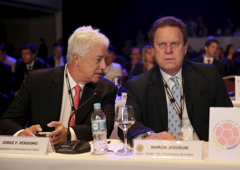 &copy; Reuters. FILE PHOTO: President of Colombia's soccer league governing body Dimayor Jorge Perdomo (L) and President of Colombia's Football Federation Ramon Jesurun talk during a meeting at the South American Football confederation CONMEBOL in Luque, Paraguay, Januar