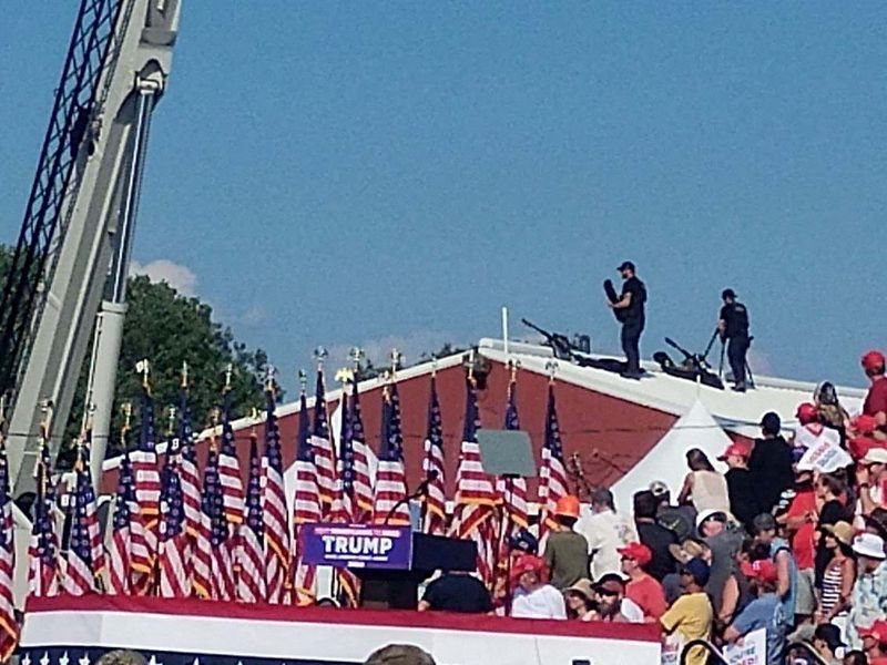 &copy; Reuters. FILE PHOTO: Snipers stand on a roof at Republican presidential candidate and former U.S. President Donald Trump's campaign rally in Butler, Pennsylvania, U.S.,  JULY 13, 2024 in this picture obtained from social media. Glen Van Tryfle/TMX/via REUTERS/File