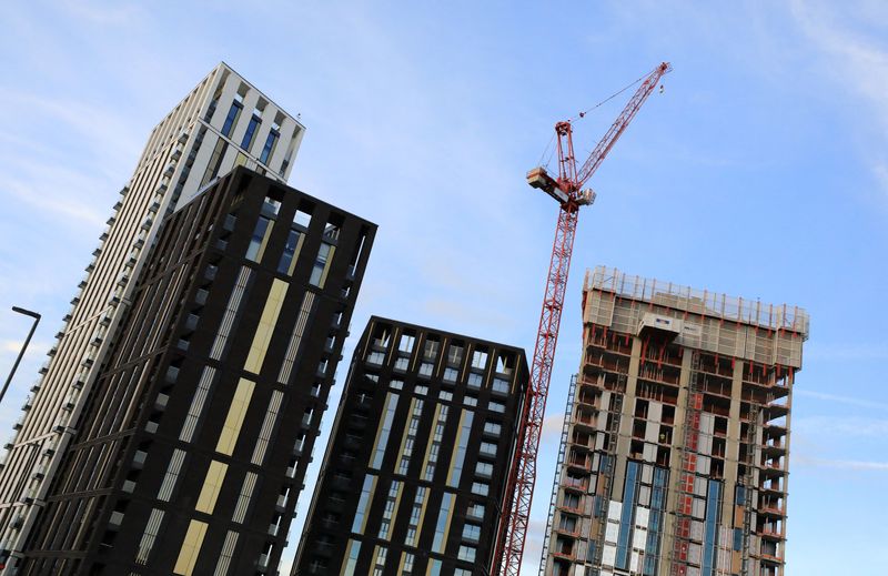 &copy; Reuters. FILE PHOTO: A crane is seen above some high rise building construction works at Lewisham, in London, Britain October 10, 2017. REUTERS/Afolabi Sotunde/File Photo