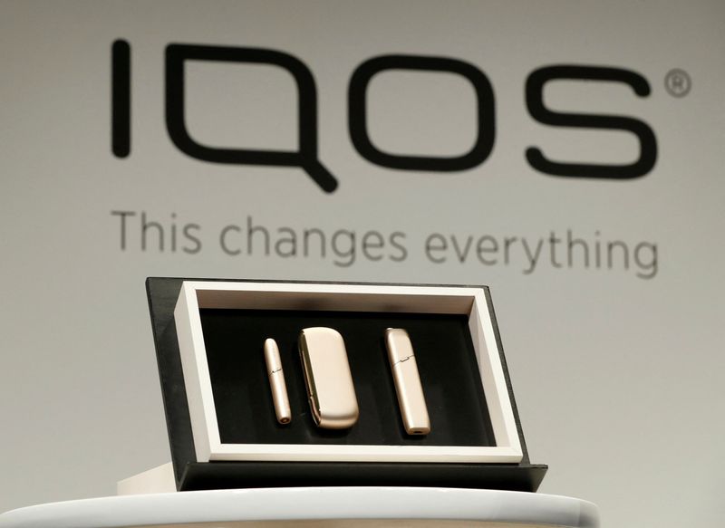 &copy; Reuters. FILE PHOTO: Philip Morris new IQOS 3 devices are displayed during a news conference by its International's CEO Andre Calantzopoulos in Tokyo, Japan, October 23, 2018.  REUTERS/Kim Kyung-Hoon/File Photo