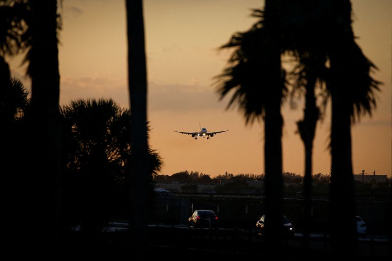 &copy; Reuters. FILE PHOTO: An aircraft approaches to land at Miami International Airport after the Federal Aviation Administration (FAA) said it had slowed the volume of airplane traffic over Florida due to an air traffic computer issue, in Miami, Florida, U.S. January 