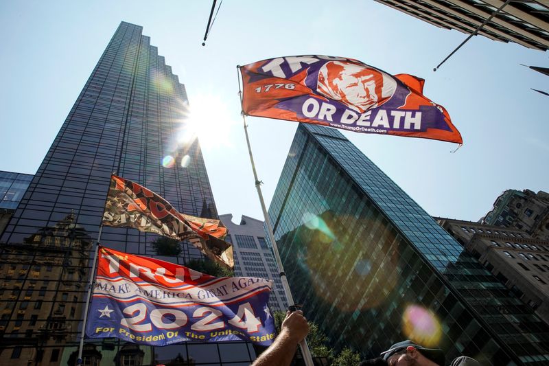 &copy; Reuters. FILE PHOTO: Flags in support of Republican presidential candidate and former U.S. President Donald Trump flutter outside Trump Tower, after Trump was injured when shots were fired during a campaign rally held in Butler, Pennsylvania, in New York, U.S., Ju