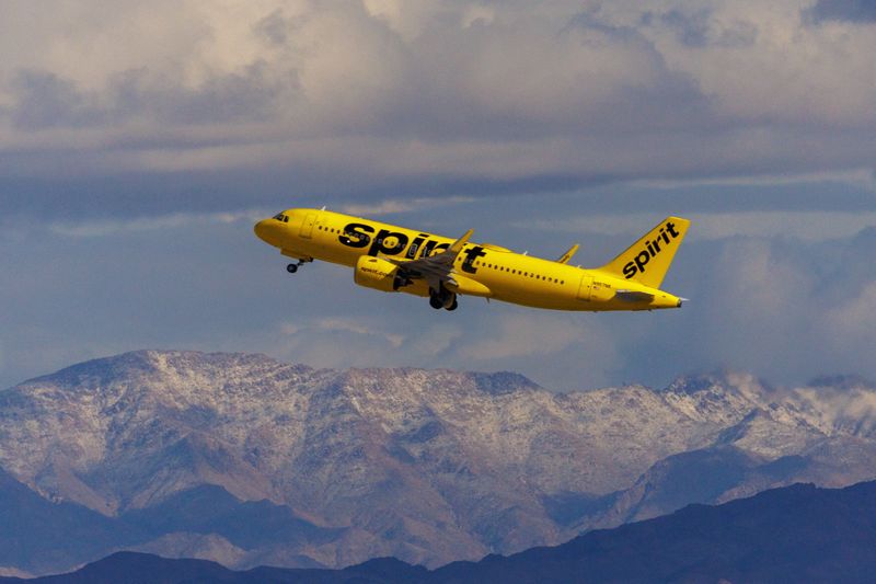 &copy; Reuters. FILE PHOTO: A Spirit Airlines commercial airliner flies after taking off from Las Vegas International Airport in Las Vegas, Nevada, U.S., February 8, 2024. REUTERS/Mike Blake/File Photo