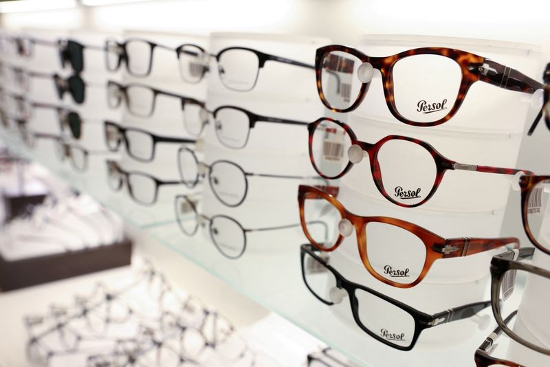 © Reuters. FILE PHOTO: Persol glasses are pictured for sale in a LensCrafters, both brands owned by EssilorLuxottica SA, in Manhattan, New York City, U.S., November 30, 2021. REUTERS/Andrew Kelly/File Photo