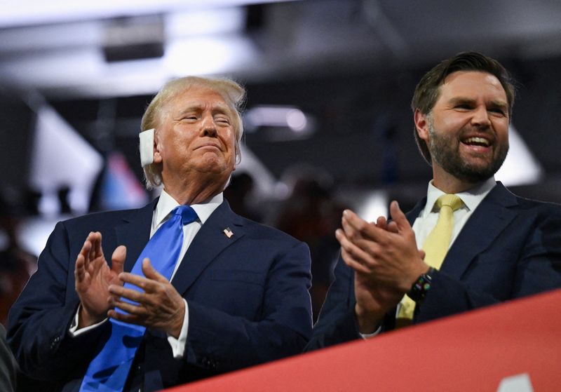 © Reuters. FILE PHOTO: Republican presidential nominee and former U.S. President Donald Trump and Republican vice presidential nominee J.D. Vance applaud on Day 2 of the Republican National Convention (RNC), at the Fiserv Forum in Milwaukee, Wisconsin, U.S., July 16, 2024. REUTERS/Callaghan O'hare/File Photo