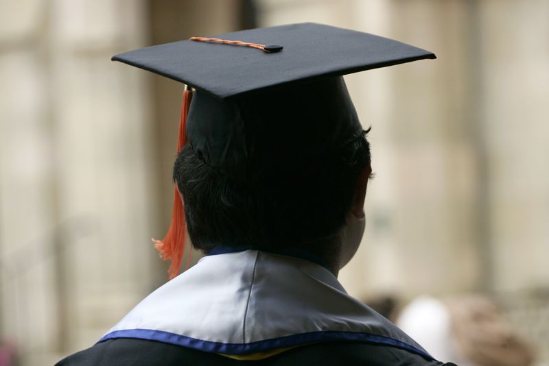 &copy; Reuters. FILE PHOTO: A student attends a graduation ceremony in Los Angeles, California. REUTERS/Jonathan Alcorn/File Photo