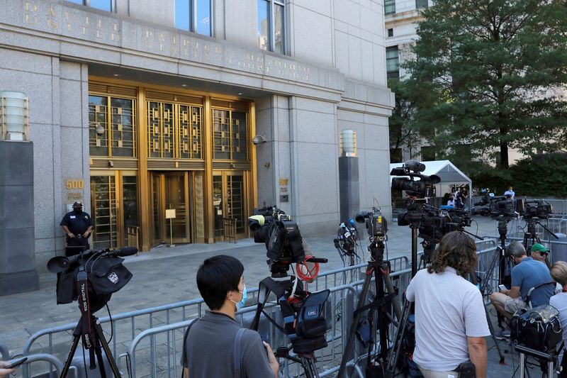 &copy; Reuters. FILE PHOTO: Members of the media gather outside the United States District Court for the Southern District of New York in Manhattan, New York City, U.S., August 20, 2020. REUTERS/Andrew Kelly/File Photo