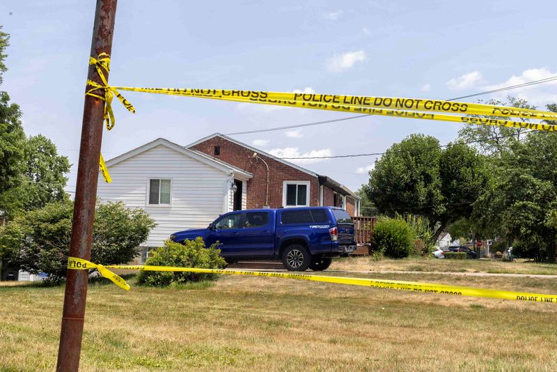 © Reuters. A view of police tape near the home of 20-year-old Thomas Matthew Crooks, named by the FBI as the 