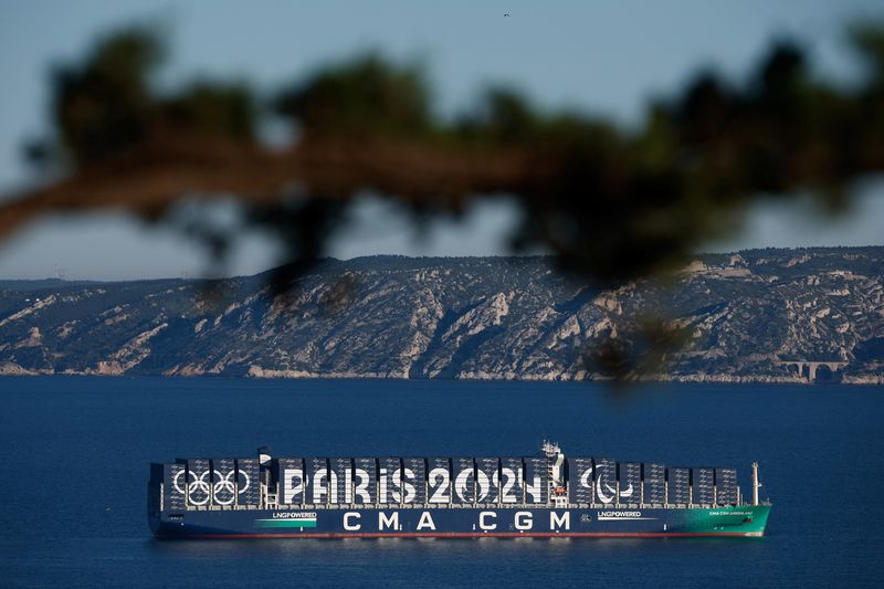 &copy; Reuters. FILE PHOTO: The CMA CGM Greenland container ship is seen at sea with Paris 2024 and the Olympic rings on it during the Olympics torch relay ahead Paris 2024 Olympic games, in Marseille, France, May 9, 2024. REUTERS/Benoit Tessier/File Photo