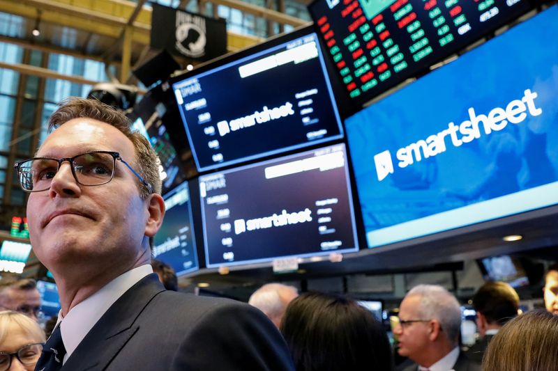 © Reuters. FILE PHOTO: Smartsheet Inc. President and CEO Mark Mader attends his company's IPO on the floor of the New York Stock Exchange (NYSE) in New York, U.S., April 27, 2018. REUTERS/Brendan McDermid/File Photo