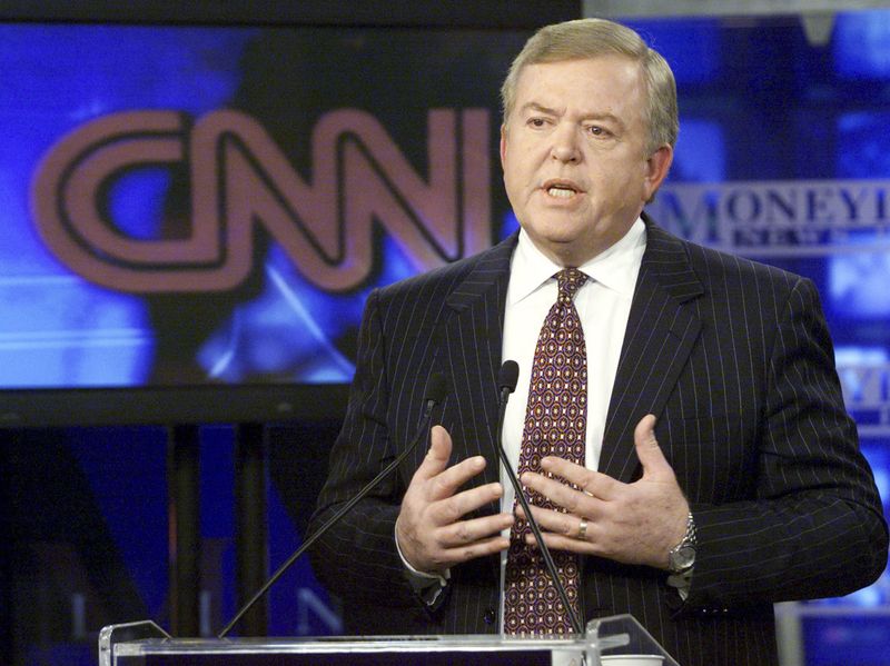 &copy; Reuters. FILE PHOTO: Lou Dobbs speaks at a press conference marking his return to anchor CNN's business news program Moneyline News hour in New York in this April 10, 2001 file photo. CNN host Dobbs said on November 11, 2009 that he is leaving CNN after nearly 30 