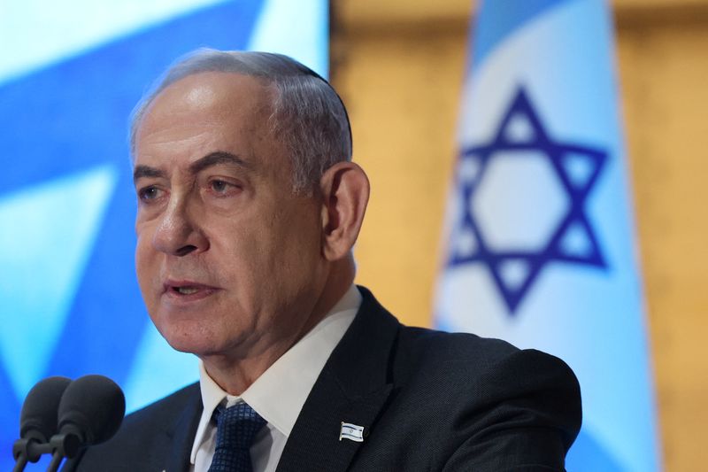 © Reuters. Israeli Prime Minister Benjamin Netanyahu attends a memorial ceremony marking a decade for Israeli fallen soldiers of the 2014 Gaza War also known as Operation Protective Edge, in the Hall of Remembrance at the Mount Herzl Military Cemetery in Jerusalem, 16 July 2024.    ABIR SULTAN/Pool via REUTERS/File Photo