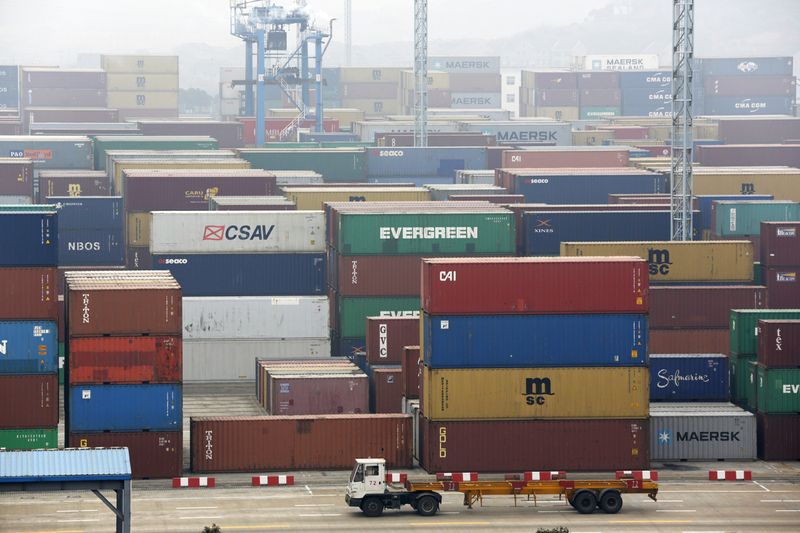 &copy; Reuters. FILE PHOTO: A trailer loaded with container boxes travels in Ningbo port in Zhejiang province, January 22, 2015. REUTERS/William Hong/File photo