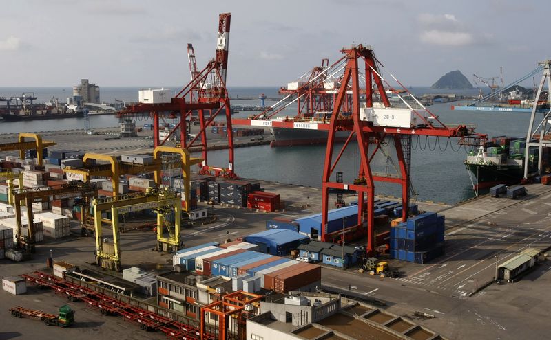 © Reuters. FILE PHOTO: A general view shows containers stacked up at Keelung port in northern Taiwan June 7, 2010. Taiwan's exports rose 57.9 percent in May from a year earlier, well above forecasts, driven by strength in the Chinese and U.S. economies, with no impact seen from problems in the euro zone. REUTERS/Pichi Chuang/File photo