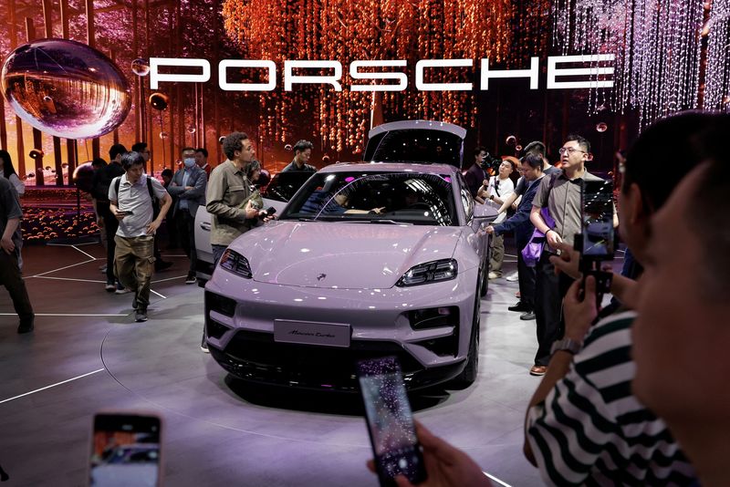 Porsche cuts forecasts, shares fall, amid alloy shortage