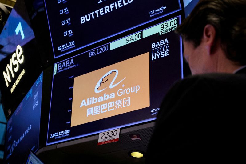 &copy; Reuters. FILE PHOTO: Trader works at the post where Alibaba is traded on the floor of the New York Stock Exchange (NYSE) in New York City, U.S., March 28, 2023.  REUTERS/Brendan McDermid/File Photo