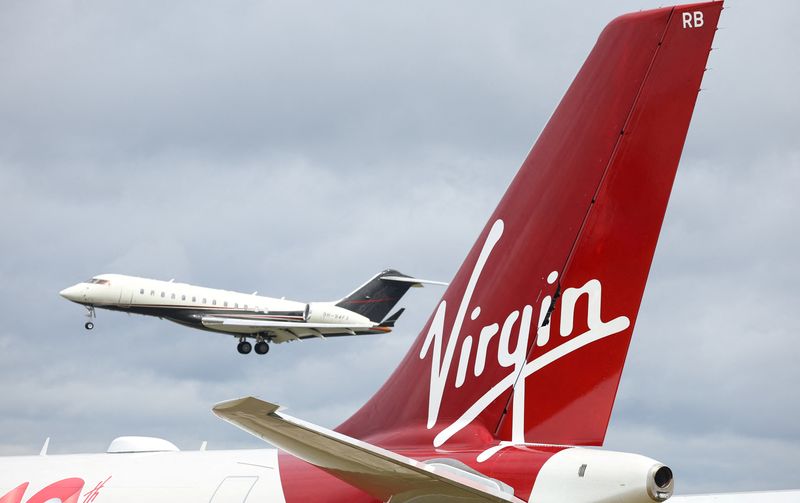 &copy; Reuters. FILE PHOTO: Branding for Virgin Atlantic is seen on a tail fin at the Farnborough International Airshow, in Farnborough, Britain, July 22, 2024. REUTERS/Toby Melville/File Photo