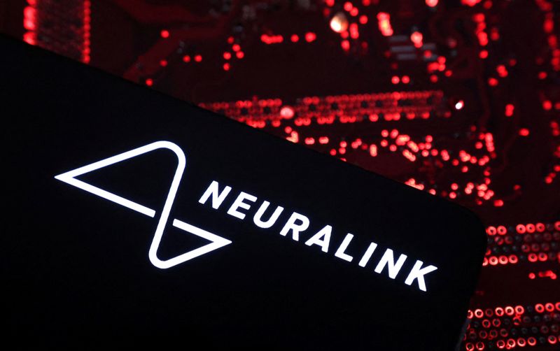 &copy; Reuters. FILE PHOTO: A smartphone with a Neuralink logo displayed is placed on a computer motherboard in this illustration taken on May 15, 2024. REUTERS/Dado Ruvic/Illustration/File Photo