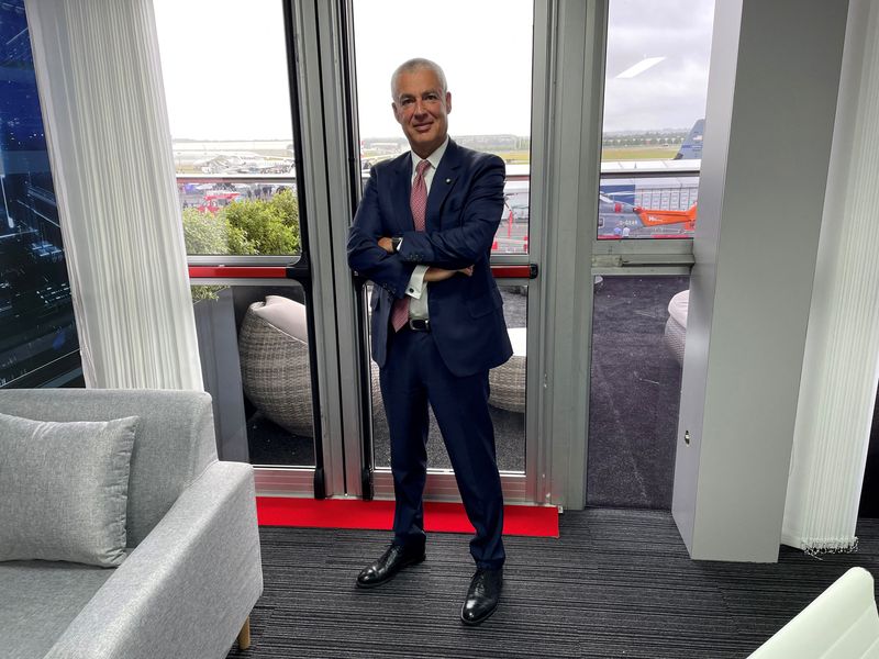 &copy; Reuters. Il co-general manager di Leonardo Lorenzo Mariani posa per una foto al Farnborough Airshow di Farnborough, in Gran Bretagna, il 23 luglio 2024. REUTERS/Joe Brock