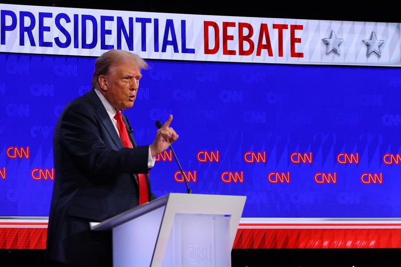 © Reuters. FILE PHOTO: Republican candidate, former U.S. President Donald Trump, speaks as he attends a presidential debate with Democrat candidate, U.S. President Joe Biden, in Atlanta, Georgia, U.S., June 27, 2024. REUTERS/Brian Snyder/File Photo