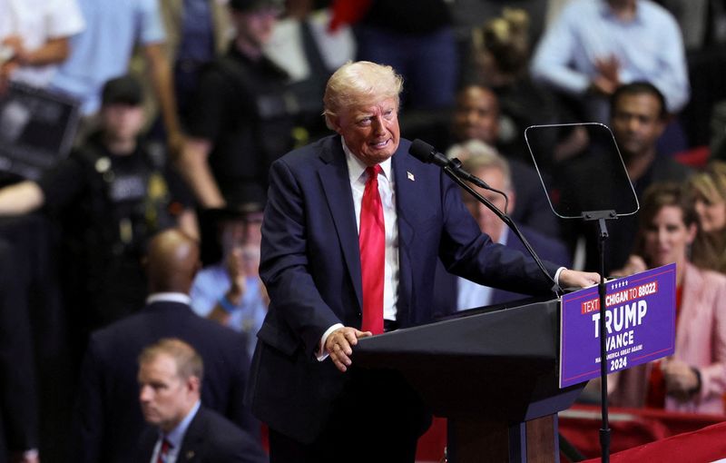 &copy; Reuters. FILE PHOTO: Republican presidential nominee and former U.S. President Donald Trump speaks, as he holds a campaign rally for the first time with his running mate, Republican vice presidential nominee U.S. Senator J.D. Vance (R-OH) in Grand Rapids, Michigan