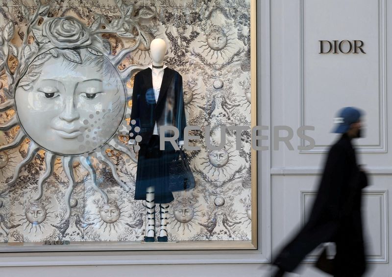 &copy; Reuters. FILE PHOTO: A man walks past a shop of fashion house Dior in Paris, France, April 15, 2024. REUTERS/Manon Cruz/File Photo