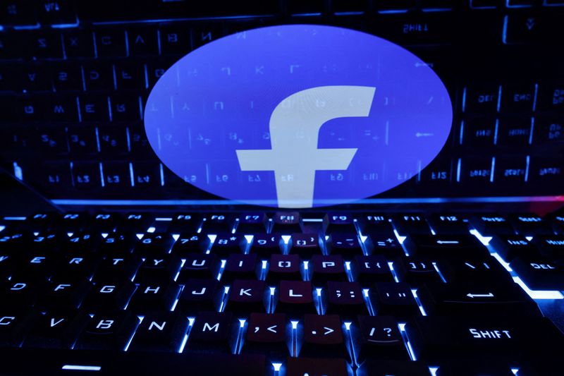 &copy; Reuters. FILE PHOTO: A keyboard is placed in front of a displayed Facebook logo in this illustration taken February 21, 2023. REUTERS/Dado Ruvic/Illustration/File Photo