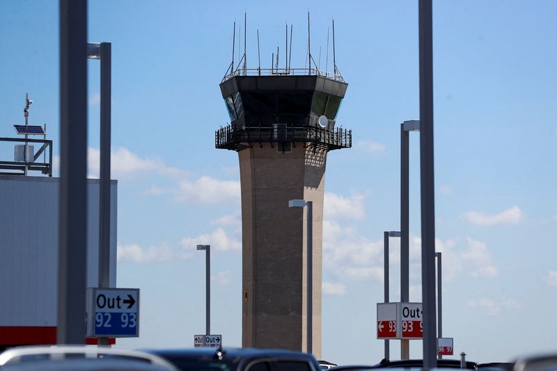 &copy; Reuters. FILE PHOTO: A view of an air traffic control tower after airlines grounded flights due to a worldwide tech outage caused by an update to CrowdStrike's "Falcon Sensor" software which crashed Microsoft Windows systems, at Tampa International Airport in Tamp