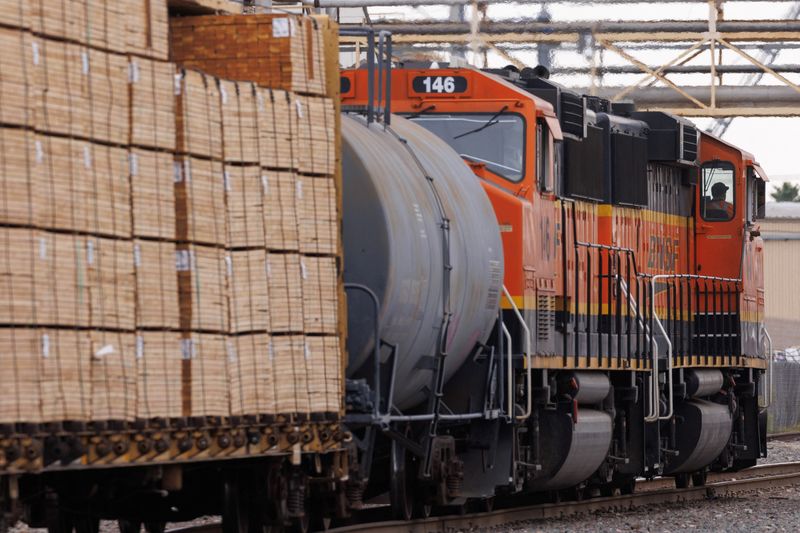 &copy; Reuters. FILE PHOTO: A railway worker drives a train engine while loading railcars in San Diego, California, U.S., November 30, 2022. REUTERS/Mike Blake/File Photo