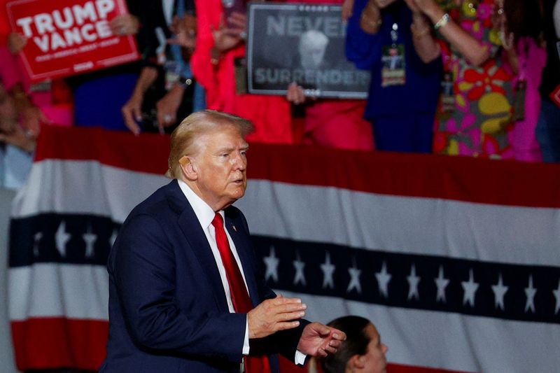 &copy; Reuters. FILE PHOTO: Republican presidential nominee and former U.S. President Donald Trump reacts on the day of his campaign in Charlotte, North Carolina, U.S. July 24, 2024.  REUTERS/Marco Bello/File Photo