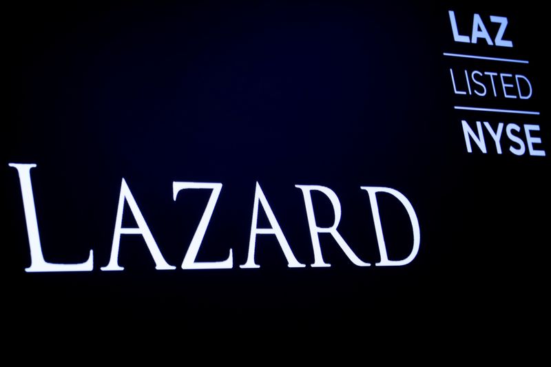 © Reuters. FILE PHOTO: The logo and trading information for Lazard Ltd appear on a screen on the floor at the New York Stock Exchange (NYSE) in New York, U.S., April 24, 2019. REUTERS/Brendan McDermid/File Photo