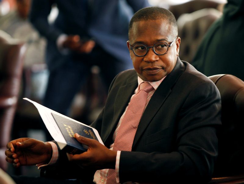 &copy; Reuters. FILE PHOTO: Zimbabwean Finance Minister Mthuli Ncube looks on before the swearing in of new cabinet ministers at State House in Harare, Zimbabwe, September 10, 2018. REUTERS/Philimon Bulawayo/File Photo