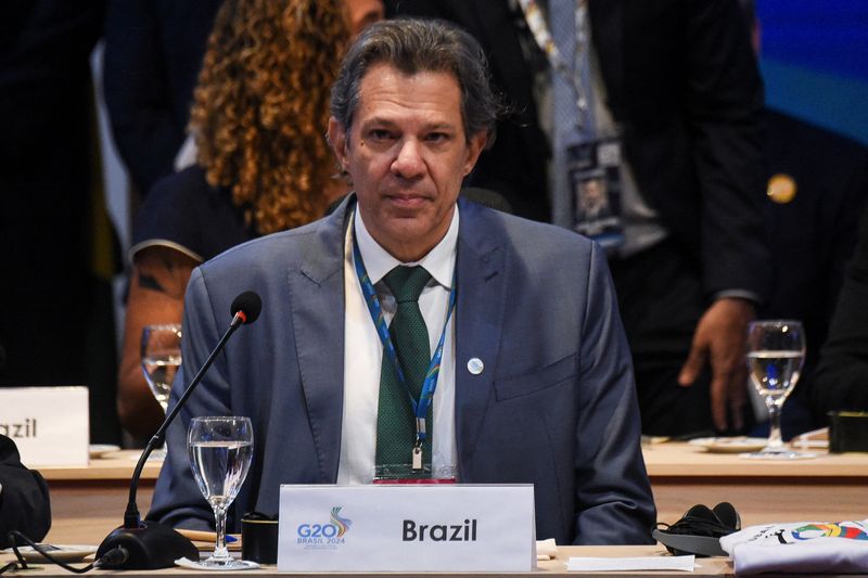 © Reuters. FILE PHOTO: Brazil's Finance Minister Fernando Haddad attends a task force meeting of the Global Alliance against Hunger and Poverty in Rio de Janeiro, Brazil, July 24, 2024. REUTERS/Tita Barros/File Photo