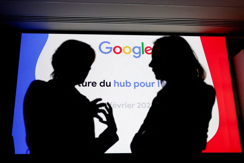 &copy; Reuters. FILE PHOTO: People are silhouetted in front of a Google logo during the inauguration of a new hub in France dedicated to the artificial intelligence (AI) sector, at the Google France headquarters in Paris, France, February 15, 2024.  REUTERS/Gonzalo Fuent