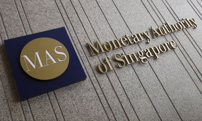 © Reuters. FILE PHOTO: The logo of the Monetary Authority of Singapore (MAS) is pictured at its building in Singapore in this February 21, 2013 file photo.  REUTERS/Edgar Su/File Photo