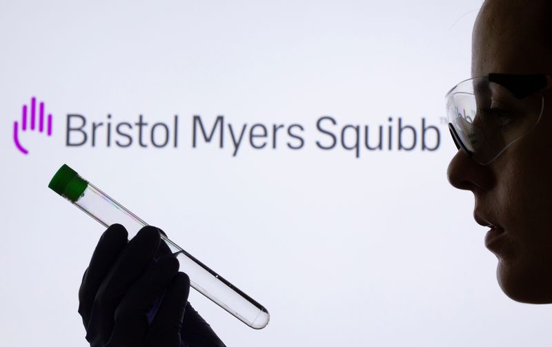 &copy; Reuters. FILE PHOTO: A woman holds test tube in front of displayed Bristol Myers Squibb logo in this illustration taken, May 21, 2021. REUTERS/Dado Ruvic/Illustration/File Photo