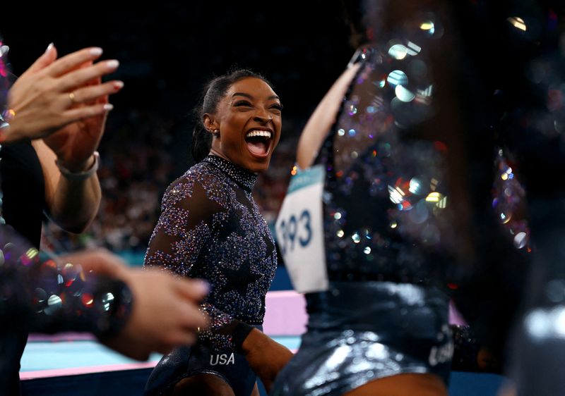 &copy; Reuters. Paris 2024 Olympics - Artistic Gymnastics - Women's Qualification - Subdivision 2 - Bercy Arena, Paris, France - July 28, 2024. Simone Biles of United States reacts after her performance on the Balance Beam. REUTERS/Hannah Mckay