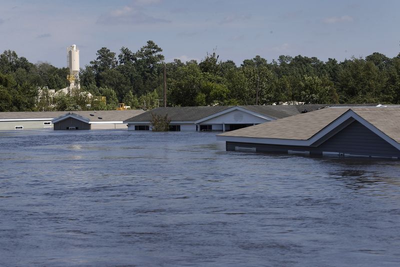 &copy; Reuters. FILE PHOTO: Submerged houses are seen by flood waters from Tropical Storm Harvey in Rose City, Texas, U.S., on August 31, 2017. REUTERS/Jonathan Bachman/File Photo    